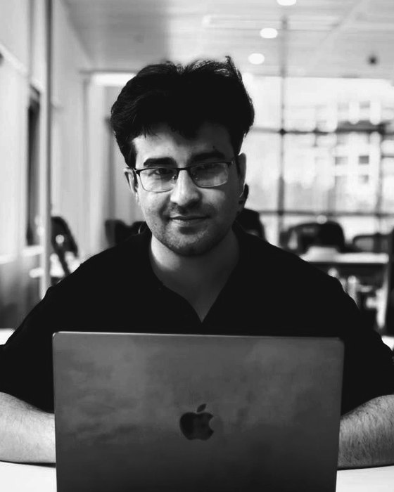 Obaid Ullah working at his laptop